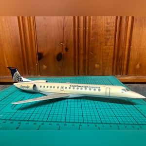 Model Embraer EMB-145 Continental ExpressJet Airplane. @1985 plastic. No stand